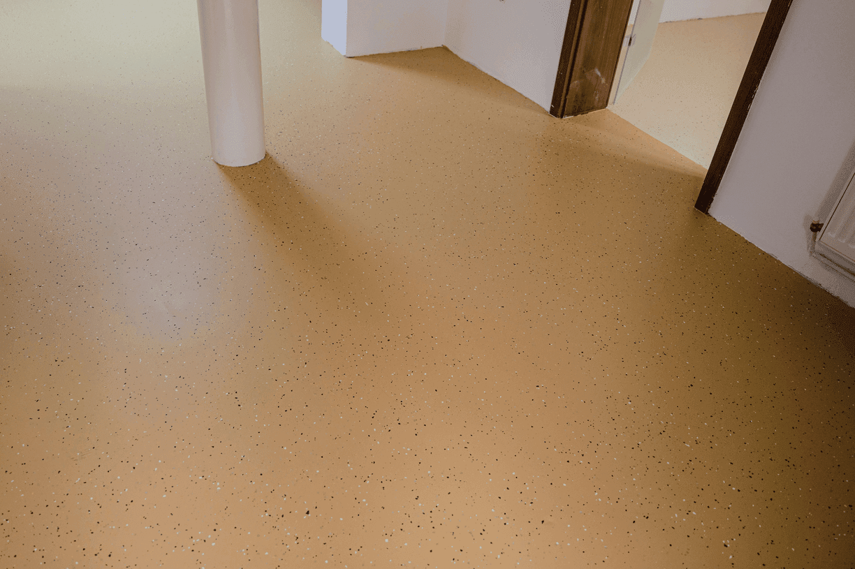 Textured anti-slip epoxy coating in a commercial entryway