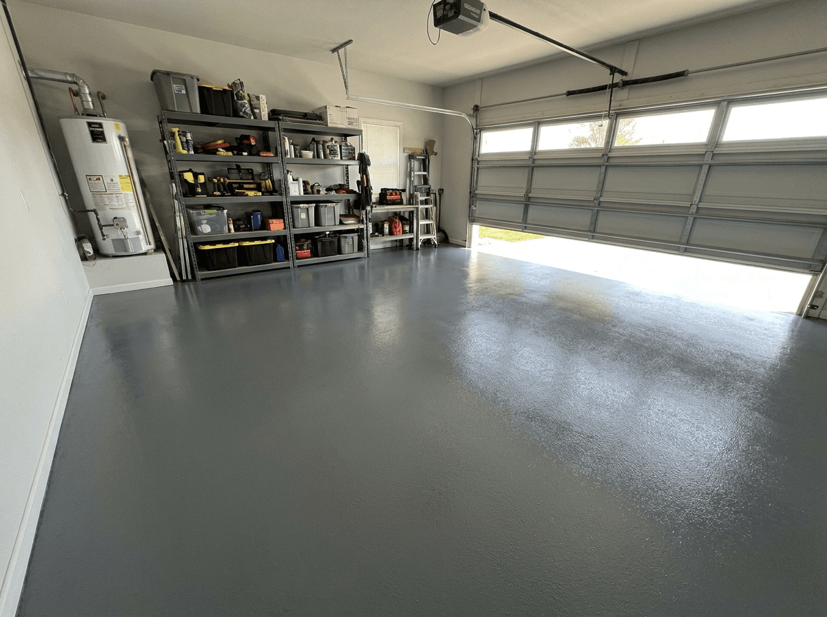 Slate grey solid color epoxy garage floor in a Sioux City area home